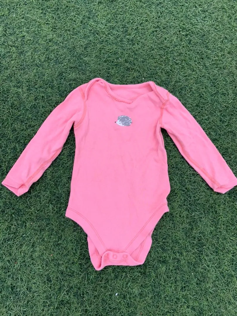 Pink baby bodysuit size 0-6months