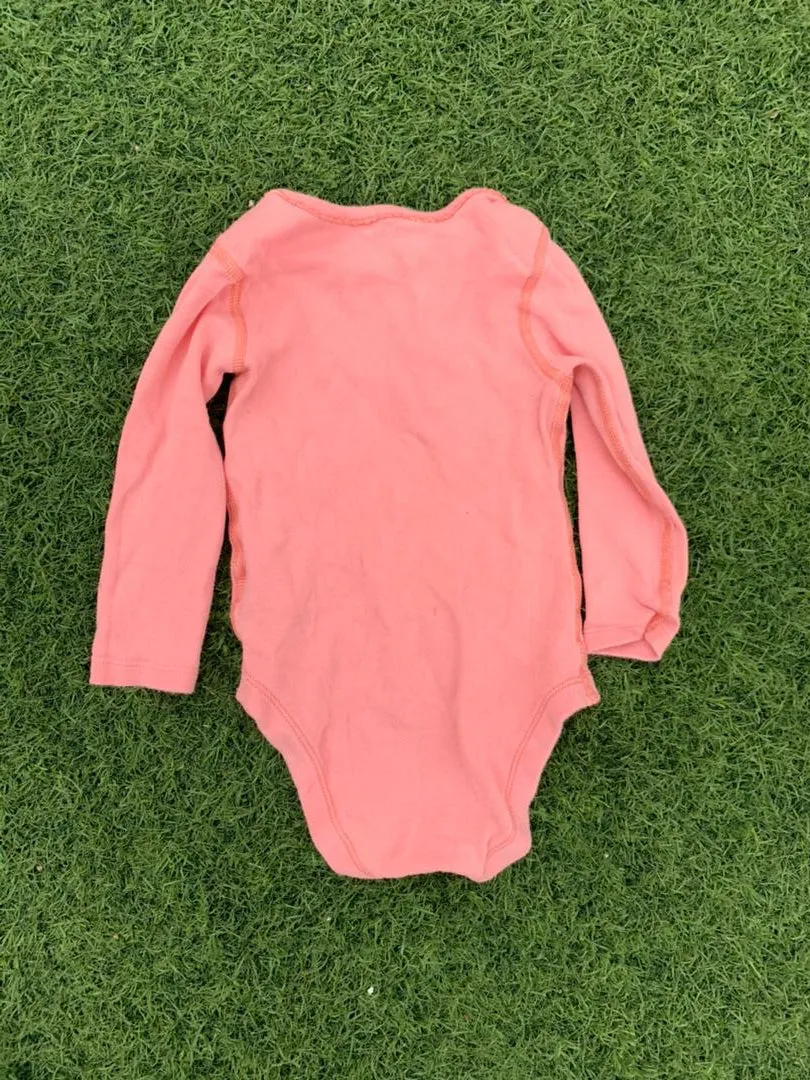 Pink baby bodysuit size 0-6months